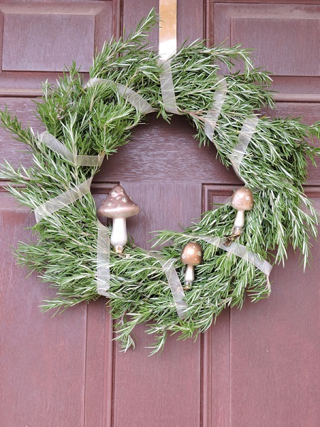 decorated wreath hanging on door