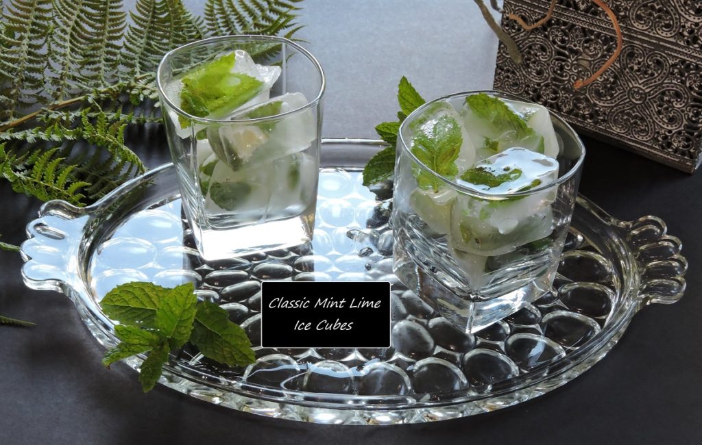 glasses filled with mint lime ice cubes