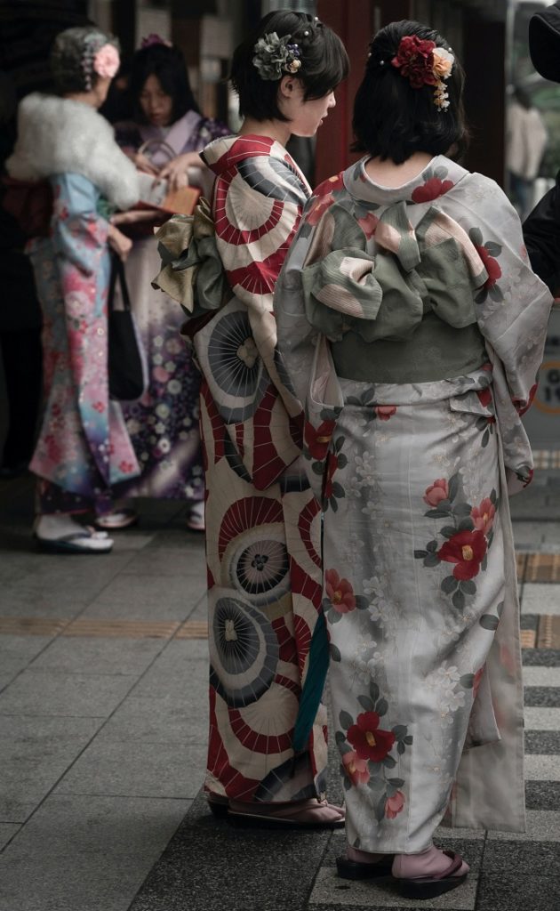 women wearing kimonos