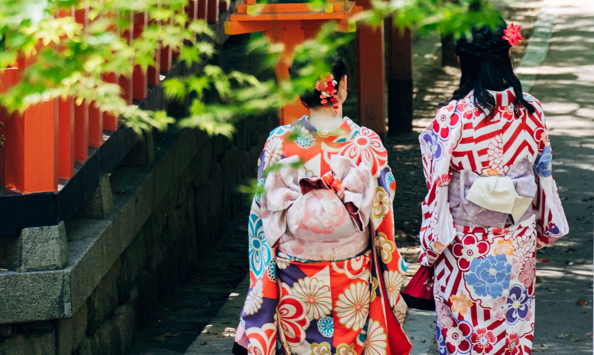 two colorful geometric and floral kimonos