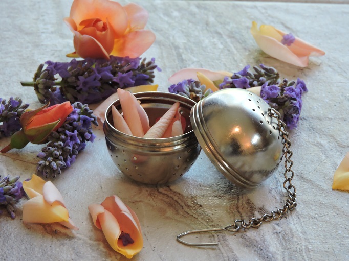 tea ball infuser filled with flower petals