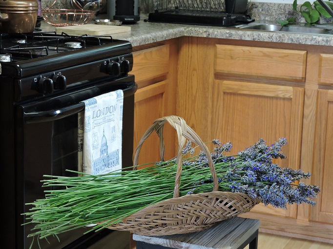 Harvested Lavender picked in a basket sitting in the Kitchen