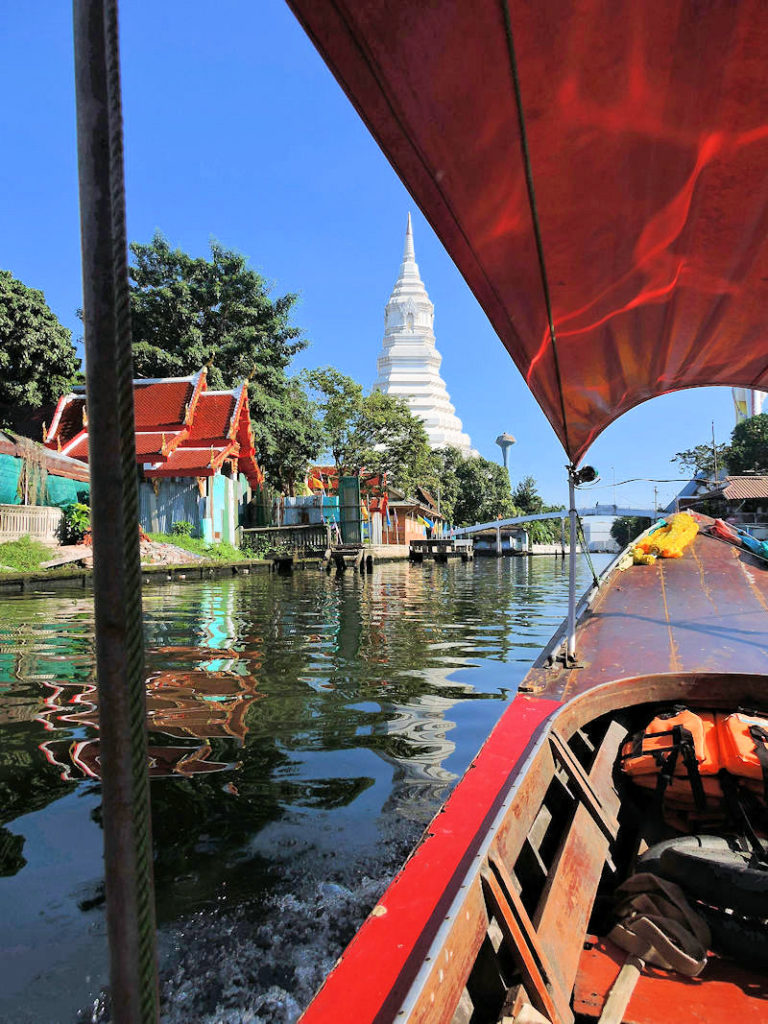 view of wat paknam stupa from river