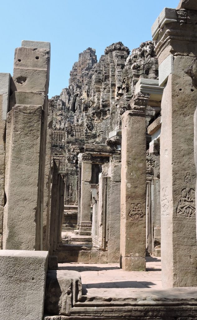 exploring walkways and columns of Banyon temple