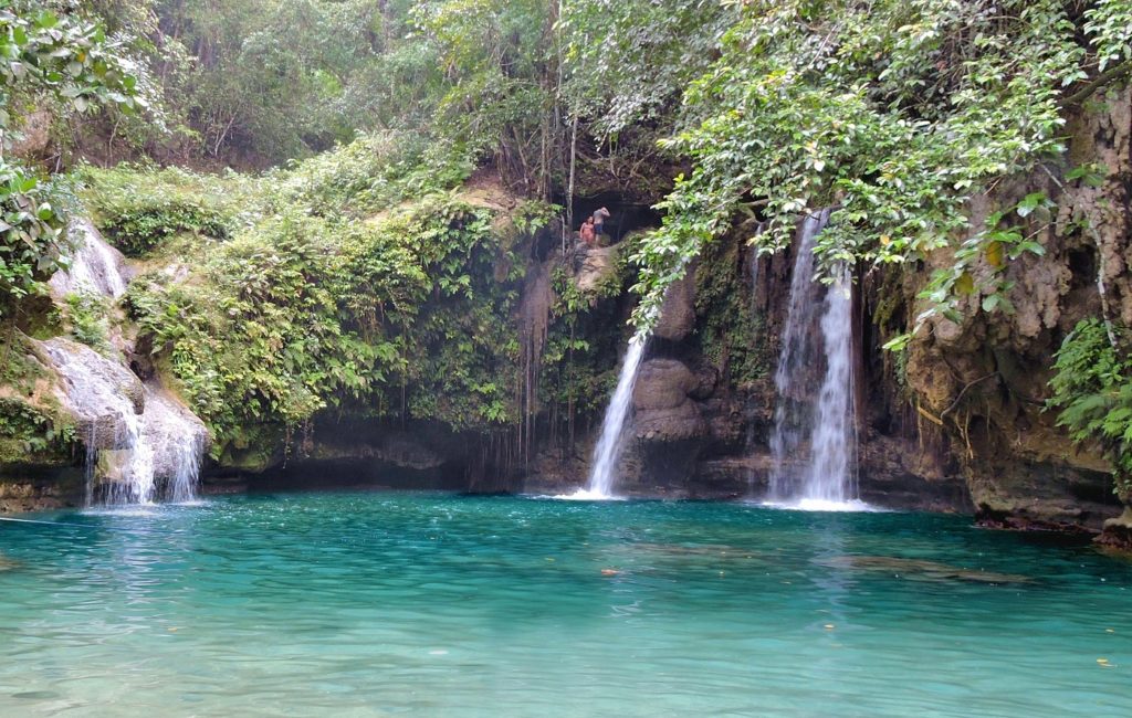 wide view of three smaller falls at Kawasan