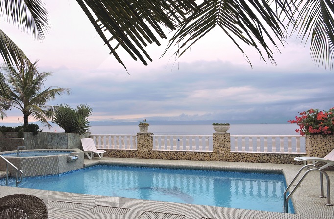 pool at hotel with view of ocean