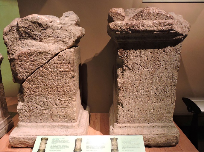 two stone altars from roman baths in museum