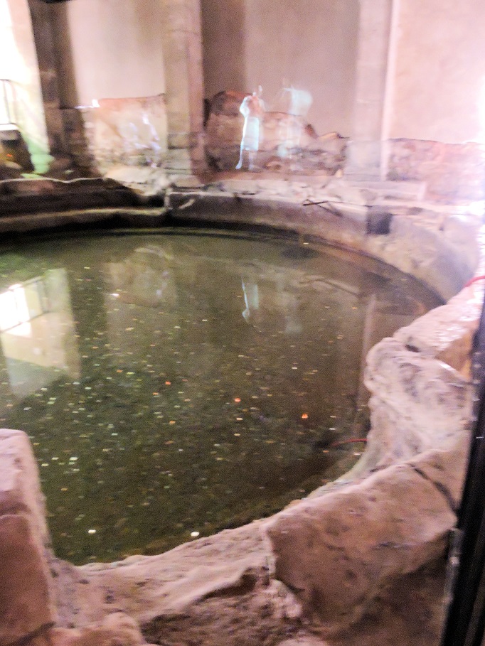 pool in roman baths with holographic projections