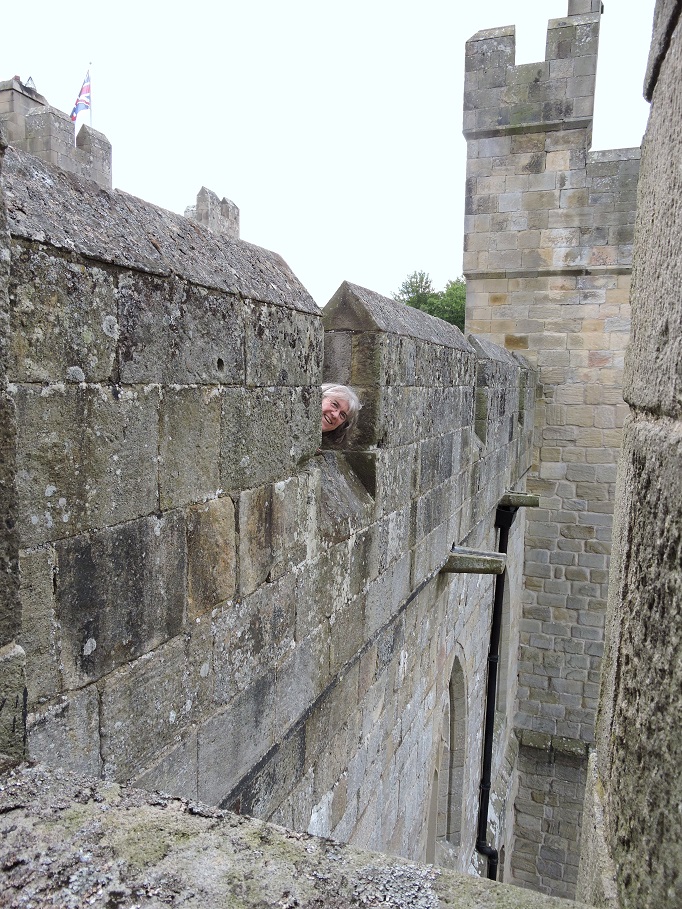 mom peering out of battlements