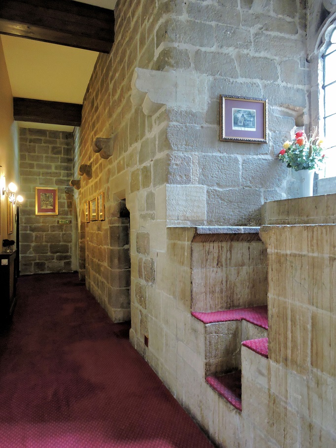 stone-hallway-red-carpet