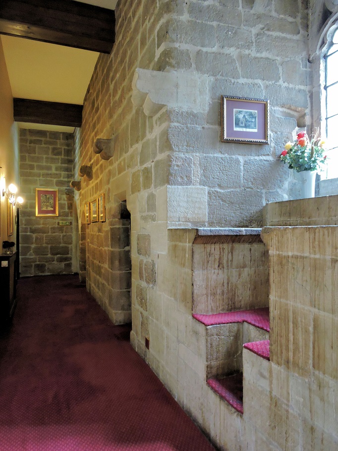 stone-hallway-red-carpet