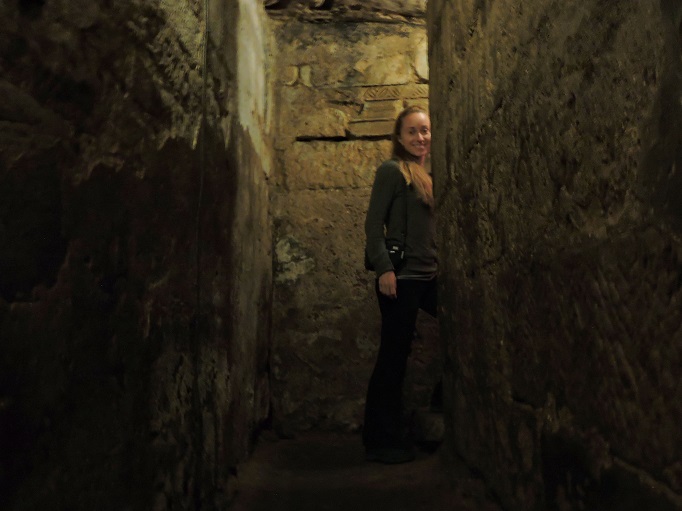 walking in dark Abbey crypt