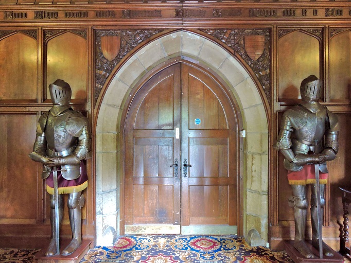 knights armour standing by door