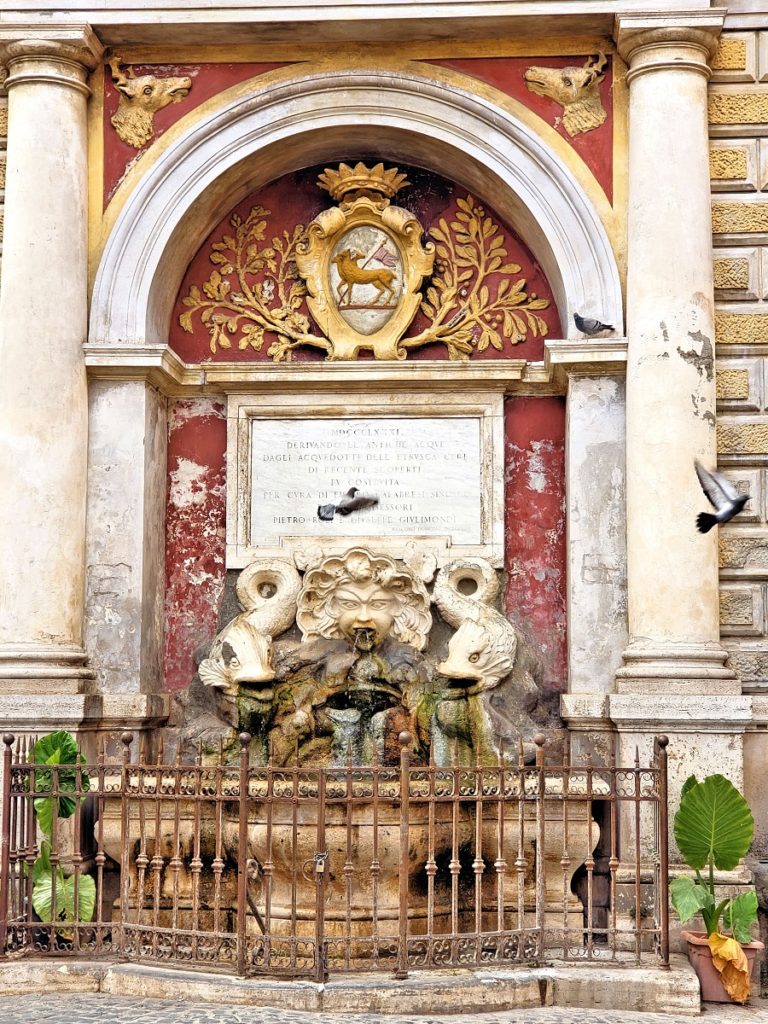 old fountain with birds
