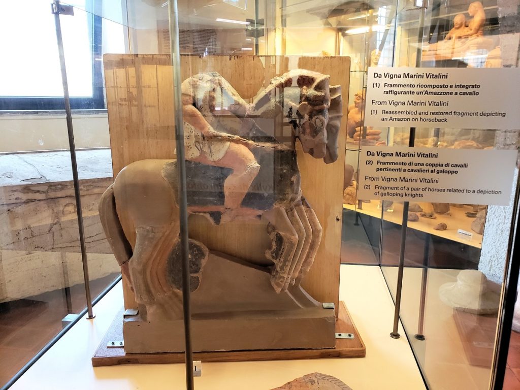 a female warrior on horseback