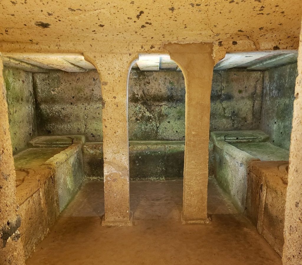 inside a tufa tomb at Banditaccia