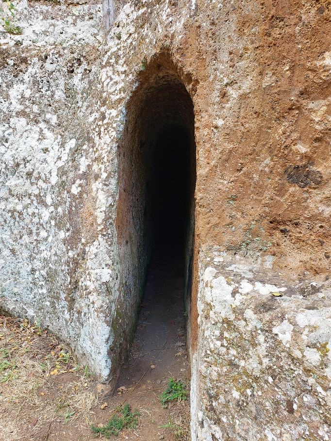 a narrow entrance carved into rock