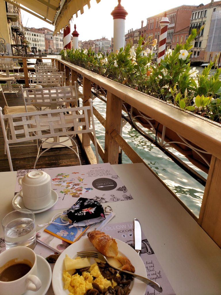 morning breakfast on the canal in venice italy
