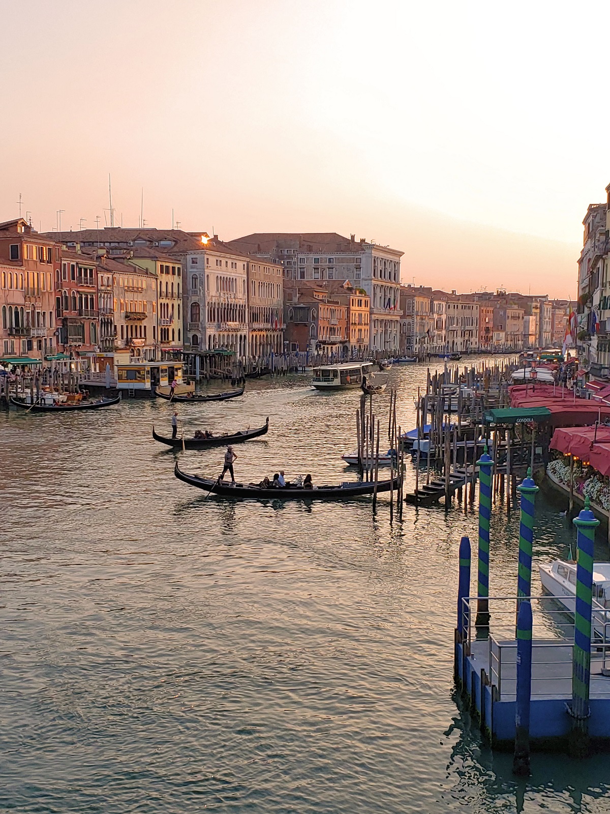 sunset with gondalas boats grand canal venice italy