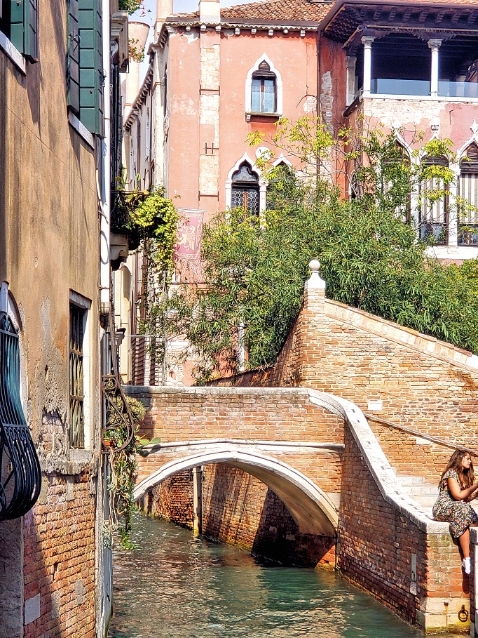 brick bridge along small canal