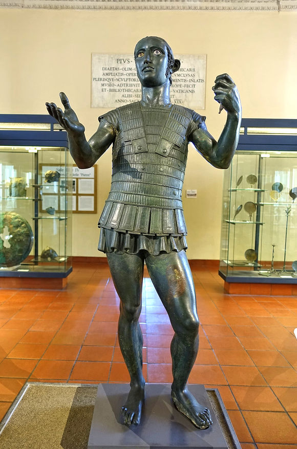 bronze of upright man