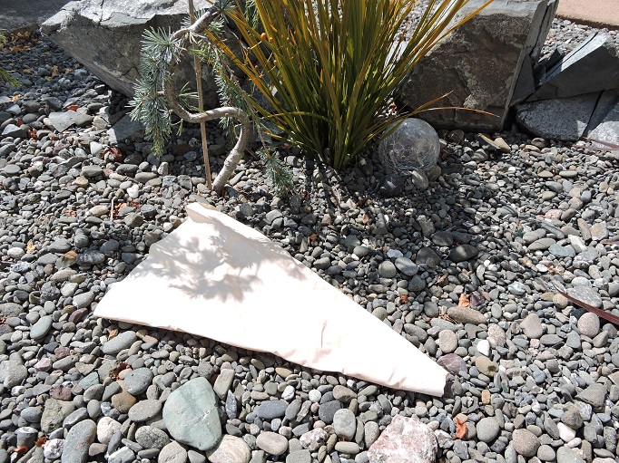 piping bag laying on rocks