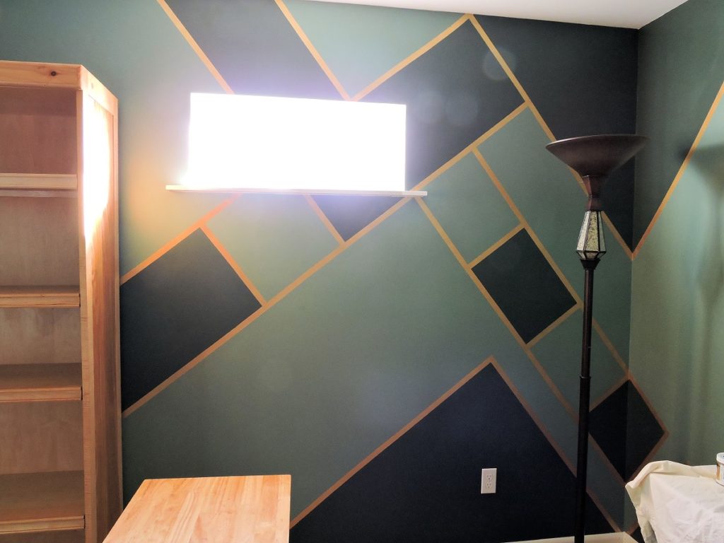 the finished look of two green shades and gold geometric lines