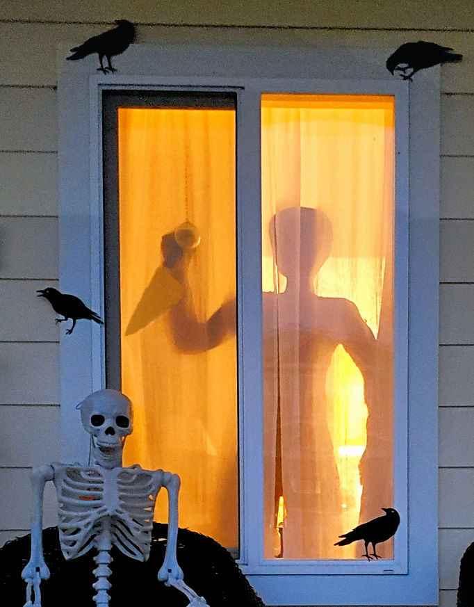 the halloween shadow killer in the window