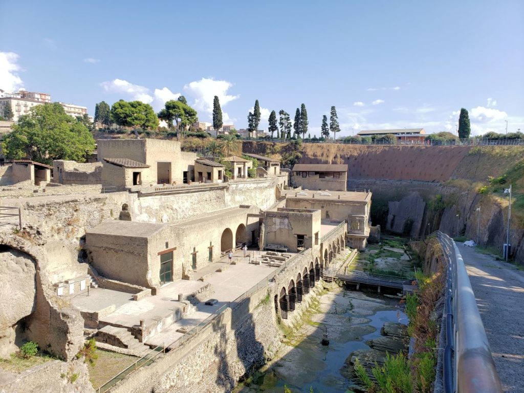 looking down on Herculaneum dug out from surrounding .