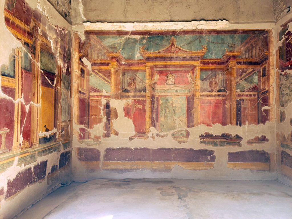 red gold blue wall fresco in room of Oplontis villa