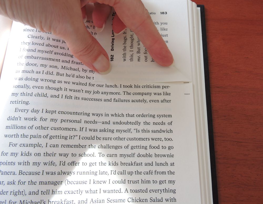 folding top corner of book page down