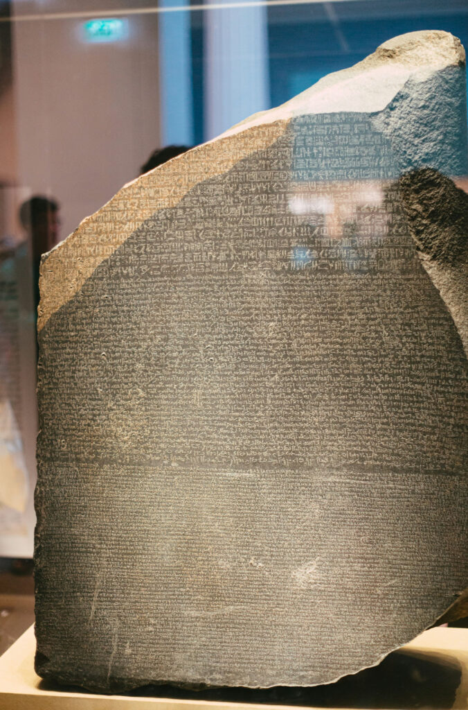the Rosetta stone in display case British museum