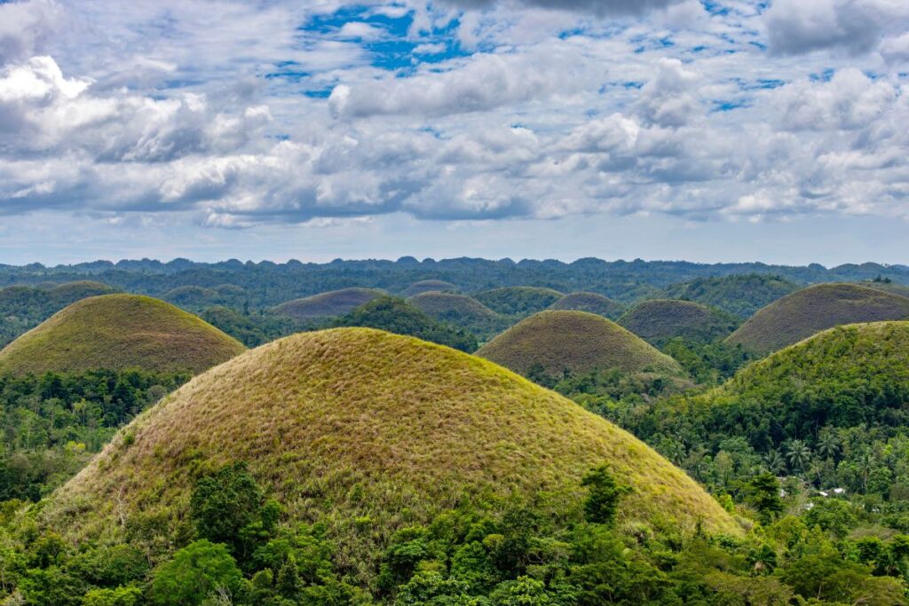 round hills rising up from jungle