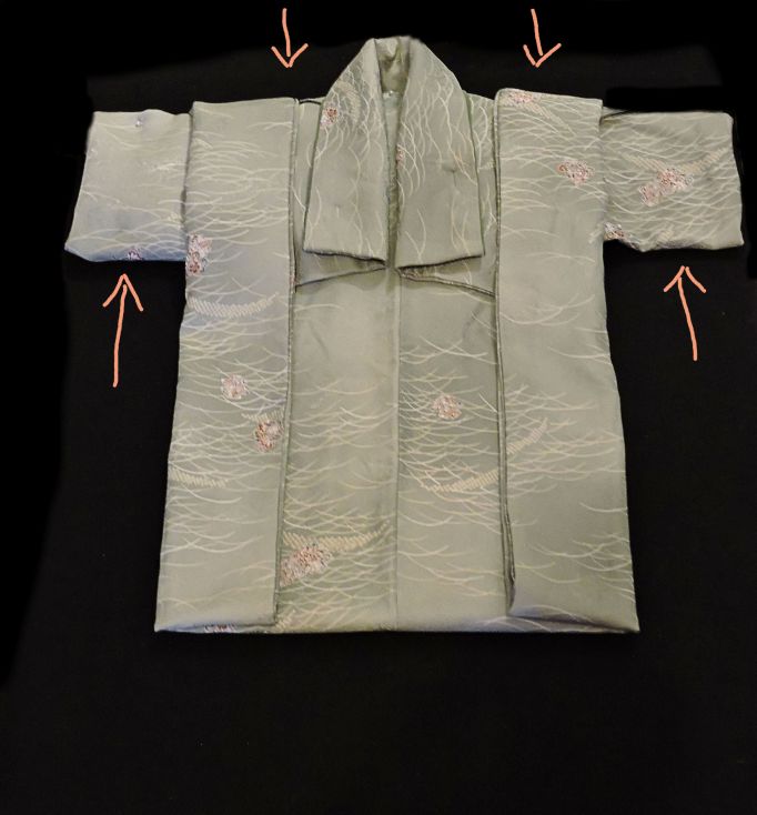 arrows showing how to fold