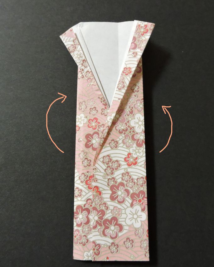 arrows show how to fold paper back on left and right