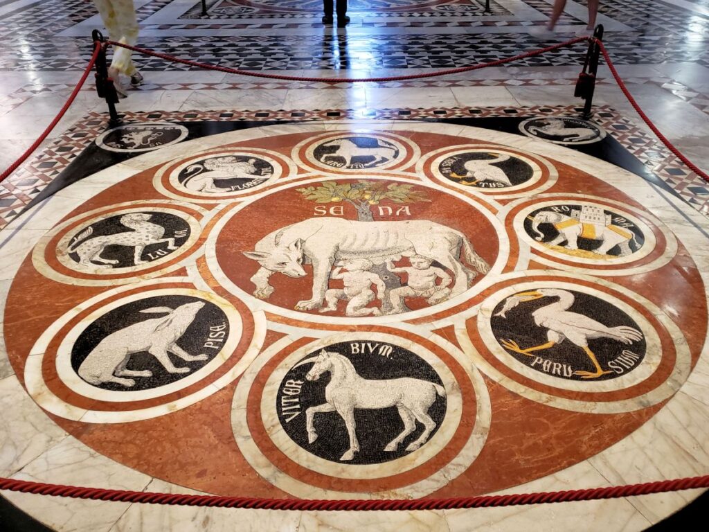 marble floor with siena wolf and other Tuscan Italian city motifs