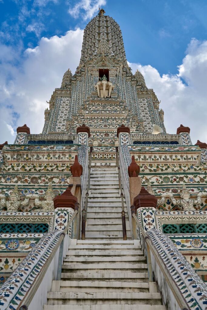 stairs going up white and mosaic decorated temple
