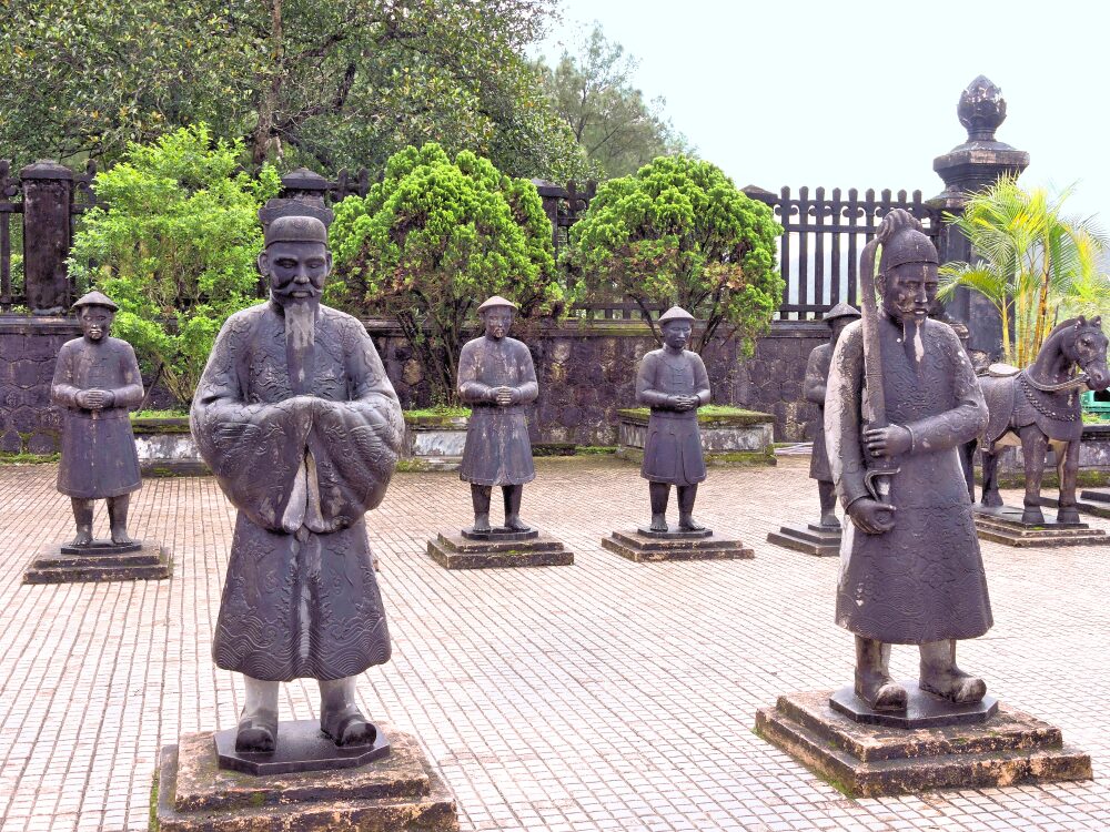 concrete statues of foot soldiers and horse