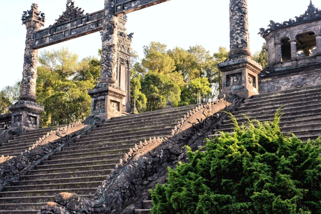 stairs up to tomb with ornate concrete carvings