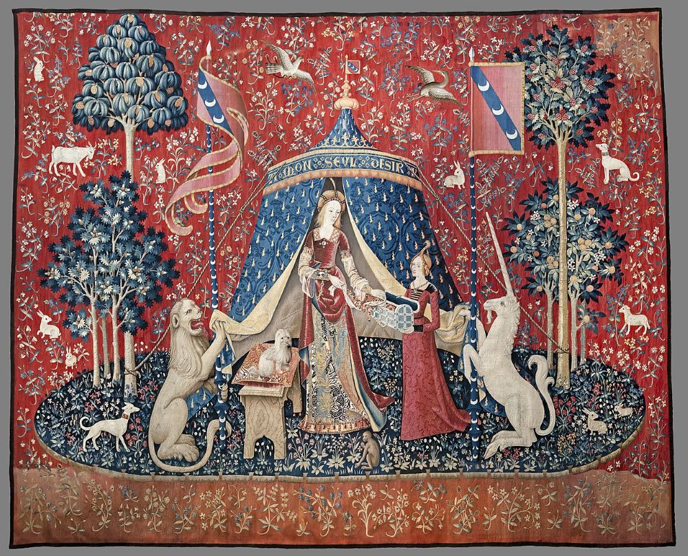 tapestry with two ladies a lion and a unicorn