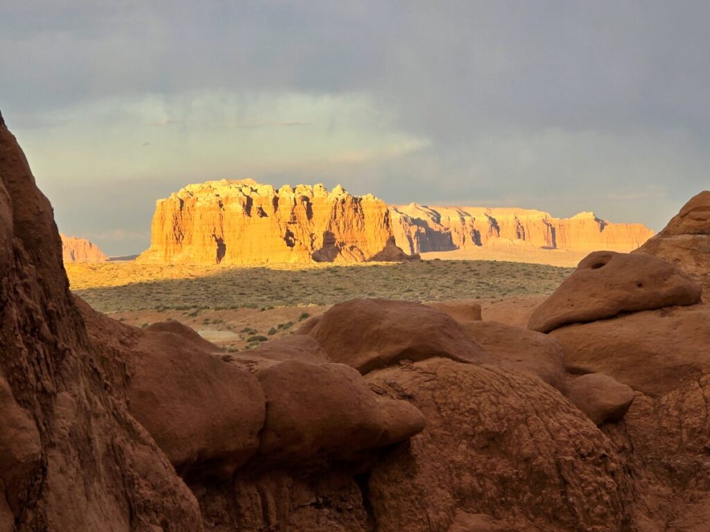 setting afternoon sun on orange cliffs at Goblin Valley